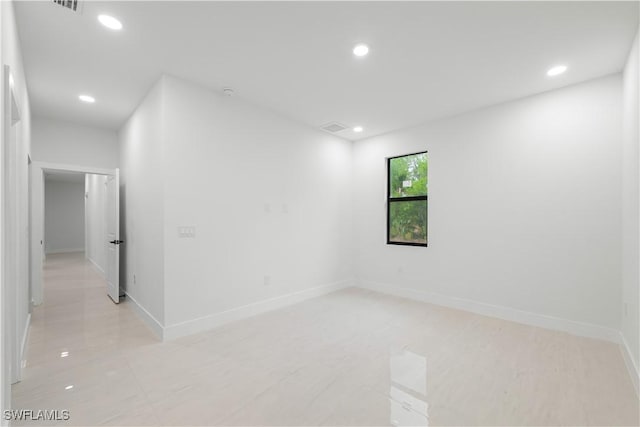 3201 18th St W, Lehigh Acres, FL 33971 - spare room featuring recessed lighting and baseboards