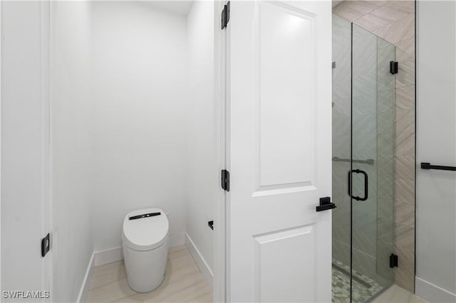 3201 18th St W, Lehigh Acres, FL 33971 - bathroom with a shower stall, baseboards, and toilet