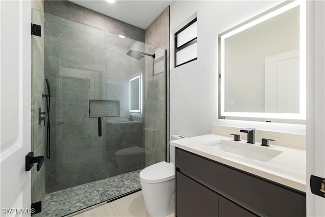 3201 18th St W, Lehigh Acres, FL 33971 - bathroom featuring toilet, a shower stall, and vanity