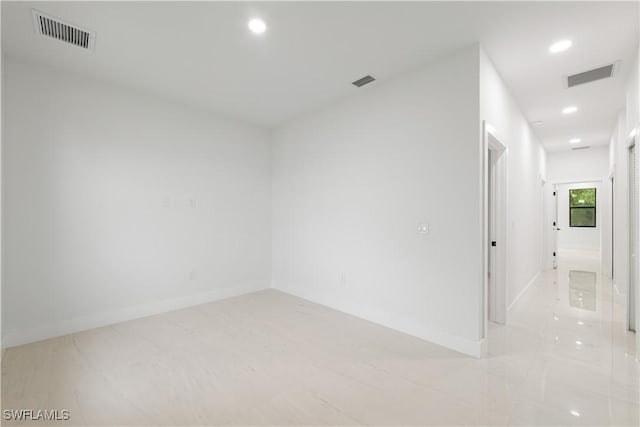 3201 18th St W, Lehigh Acres, FL 33971 - spare room featuring recessed lighting and baseboards