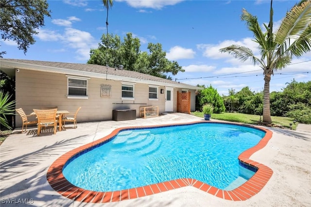 1881 N Evalena Ln, North Fort Myers, FL 33917 - swimming pool featuring a patio