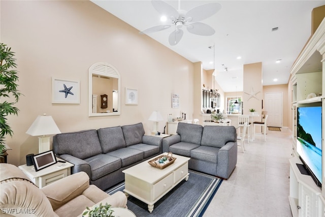 15040 Sandpiper Preserve Blvd Unit 201, Fort Myers, FL 33919 - living area with a ceiling fan, light tile patterned floors, recessed lighting, and a towering ceiling