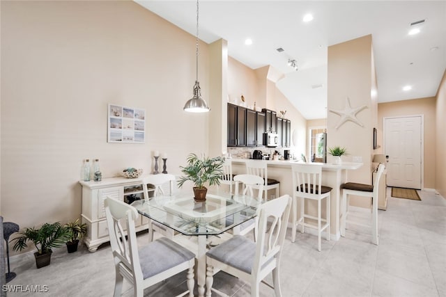 15040 Sandpiper Preserve Blvd Unit 201, Fort Myers, FL 33919 - dining space featuring high vaulted ceiling