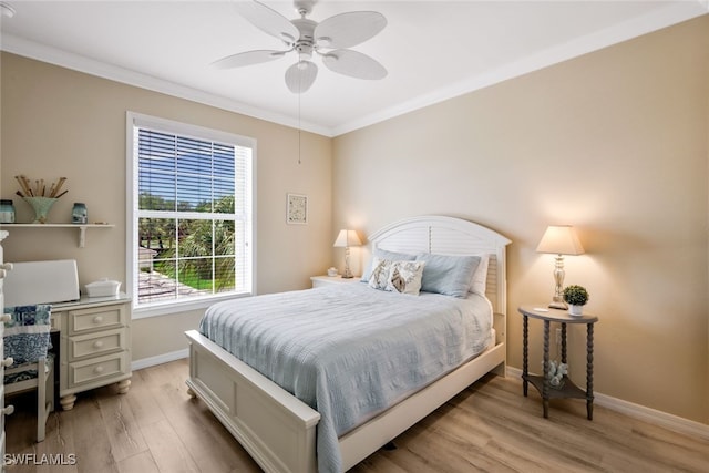 15040 Sandpiper Preserve Blvd Unit 201, Fort Myers, FL 33919 - bedroom with light wood-style floors, crown molding, baseboards, and a ceiling fan