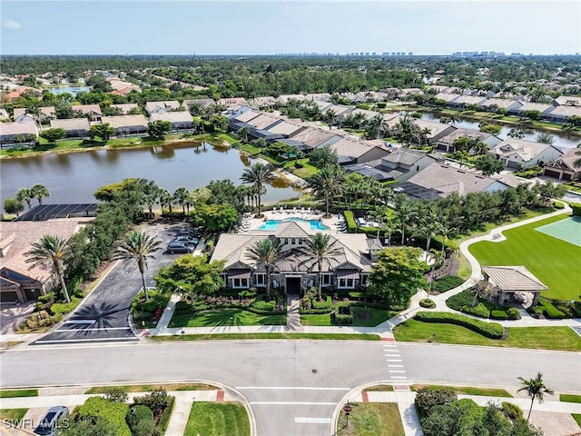 16289 Camden Lakes Cir, Naples, FL 34110 - aerial view of residential area featuring a nearby body of water and a pool area