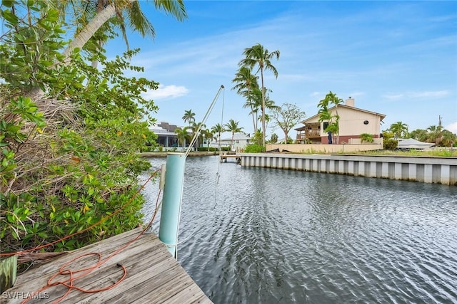 3261 Lakeview Dr, Naples, FL 34112 - dock area featuring a water view