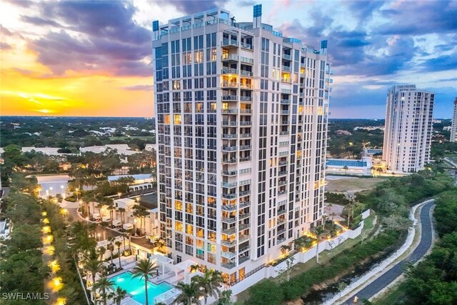 6897 Grenadier Blvd Unit 601, Naples, FL 34108 - view of building exterior with a city view