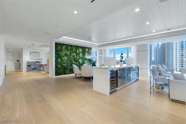 6897 Grenadier Blvd Unit 601, Naples, FL 34108 - living room with wine cooler, light wood-style flooring, and recessed lighting