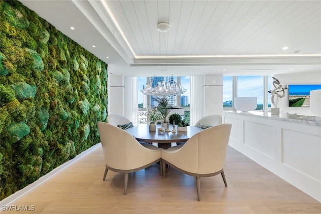 6897 Grenadier Blvd Unit 601, Naples, FL 34108 - dining room with light wood-style flooring, plenty of natural light, wooden ceiling, and a chandelier