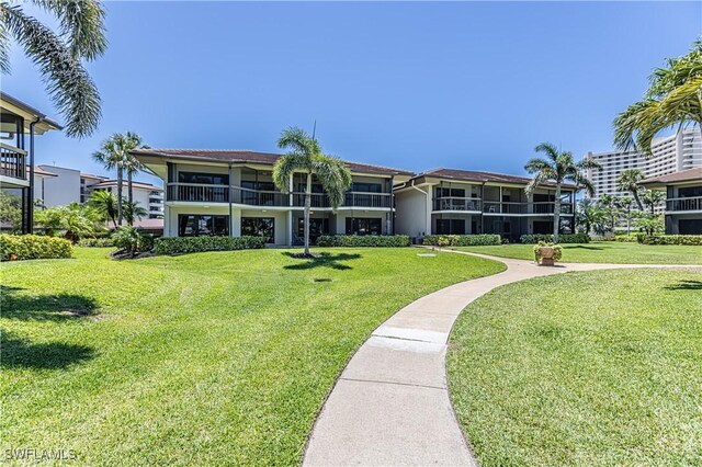525 Seaview Ct Unit M1, Marco Island, FL 34145 - view of home's community with a lawn