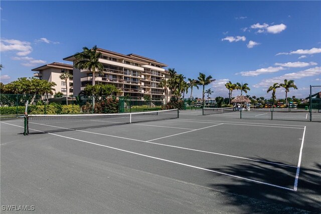 525 Seaview Ct Unit M1, Marco Island, FL 34145 - view of tennis court with fence