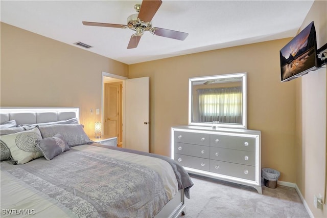 310 Lake Ave, Lehigh Acres, FL 33936 - carpeted bedroom featuring ceiling fan and baseboards