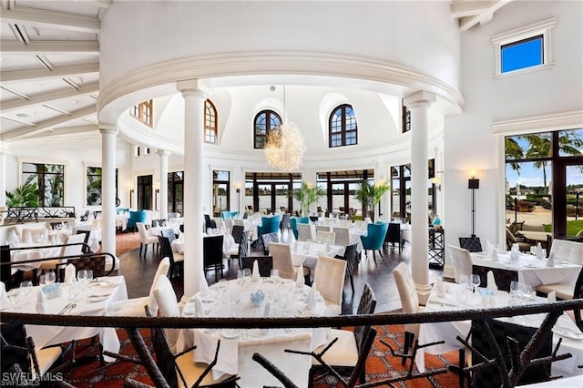 10692 Mirasol Dr Unit 1004, Miromar Lakes, FL 33913 - common area featuring a towering ceiling and beamed ceiling