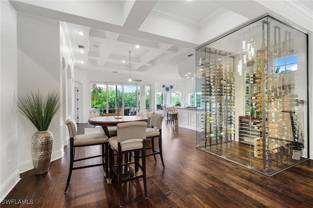 10692 Mirasol Dr Unit 1004, Miromar Lakes, FL 33913 - dining room with dark wood finished floors, coffered ceiling, beam ceiling, recessed lighting, and baseboards