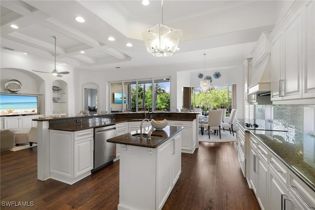 10692 Mirasol Dr Unit 1004, Miromar Lakes, FL 33913 - kitchen with dishwasher, a center island with sink, a chandelier, recessed lighting, and dark wood-type flooring