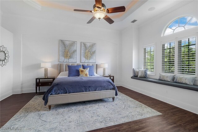 10692 Mirasol Dr Unit 1004, Miromar Lakes, FL 33913 - bedroom featuring a raised ceiling, wood finished floors, ornamental molding, baseboards, and ceiling fan