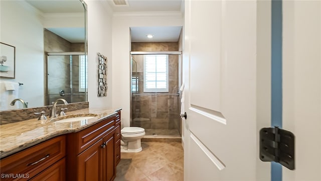 10692 Mirasol Dr Unit 1004, Miromar Lakes, FL 33913 - full bath with a shower stall, vanity, toilet, crown molding, and tile patterned floors