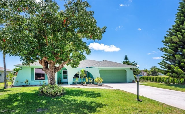 938 Charlemagne Blvd, Naples, FL 34112 - single story home with an attached garage, stucco siding, concrete driveway, and a front lawn