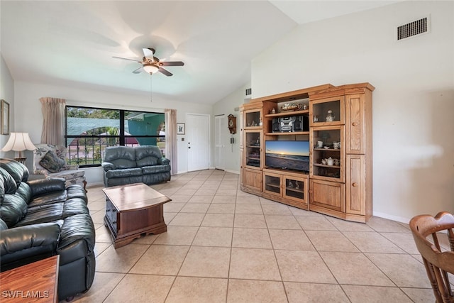 938 Charlemagne Blvd, Naples, FL 34112 - living area featuring lofted ceiling, a ceiling fan, and light tile patterned floors