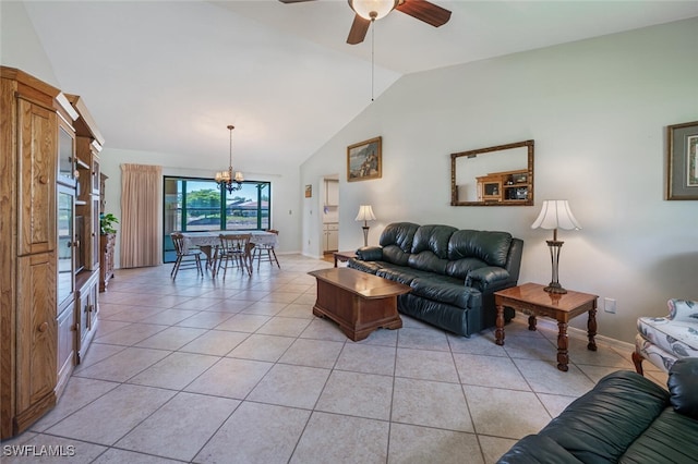 938 Charlemagne Blvd, Naples, FL 34112 - living area featuring a chandelier, lofted ceiling, light tile patterned flooring, a ceiling fan, and baseboards