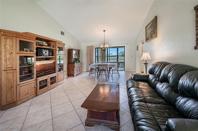 938 Charlemagne Blvd, Naples, FL 34112 - living area with a chandelier, high vaulted ceiling, and light tile patterned floors