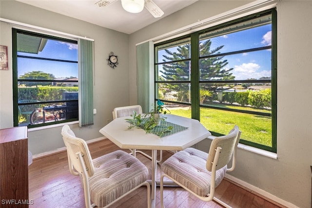 938 Charlemagne Blvd, Naples, FL 34112 - dining space featuring wood-type flooring, ceiling fan, and baseboards