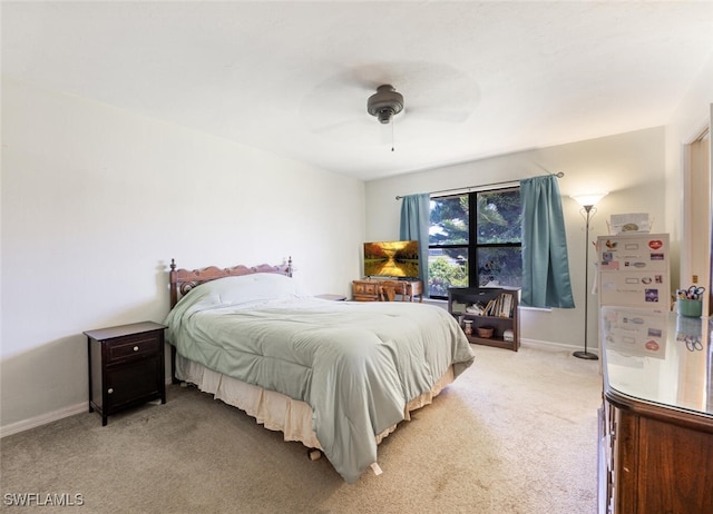 938 Charlemagne Blvd, Naples, FL 34112 - bedroom featuring light carpet, ceiling fan, and baseboards