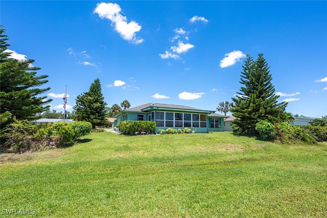 938 Charlemagne Blvd, Naples, FL 34112 - view of green lawn featuring a sunroom