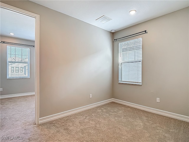 4564 Almada Ln, Wesley Chapel, FL 33543 - empty room featuring carpet and baseboards