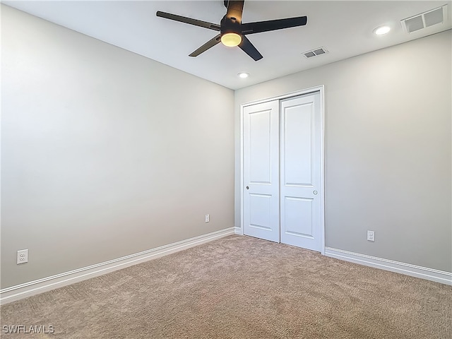 4564 Almada Ln, Wesley Chapel, FL 33543 - unfurnished bedroom featuring carpet floors, a closet, baseboards, recessed lighting, and ceiling fan