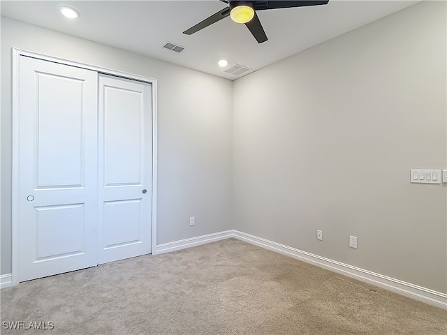 4564 Almada Ln, Wesley Chapel, FL 33543 - unfurnished bedroom with carpet floors, a closet, baseboards, recessed lighting, and ceiling fan