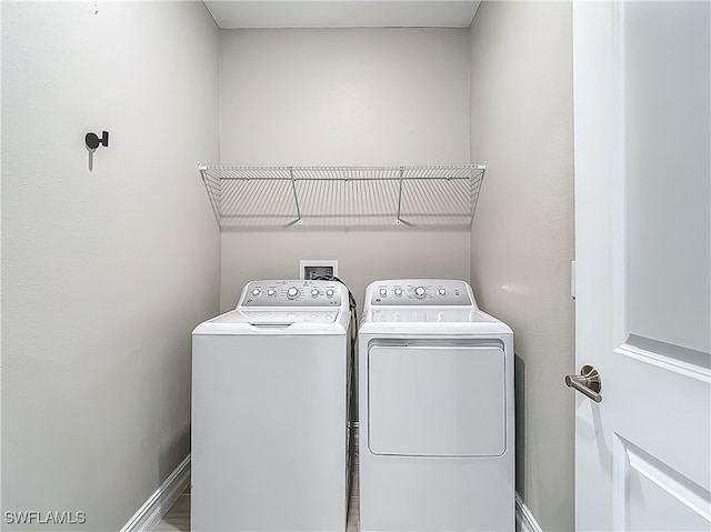 4564 Almada Ln, Wesley Chapel, FL 33543 - washroom with washer and clothes dryer