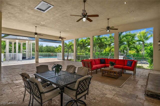 3270 Collingtree Ct, Naples, FL 34105 - view of patio with an outdoor living space, ceiling fan, and outdoor dining space