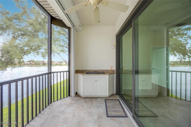 2432 Ravenna Blvd Unit 4, Naples, FL 34109 - unfurnished sunroom featuring a water view and ceiling fan