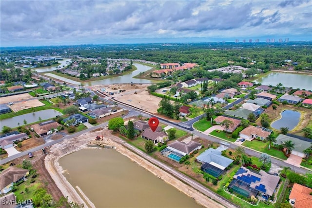 24979 Paradise Rd, Bonita Springs, FL 34135 - view of property location with a large body of water and nearby suburban area