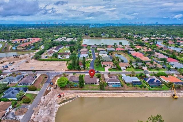 24979 Paradise Rd, Bonita Springs, FL 34135 - aerial overview of property's location with a large body of water and nearby urban area