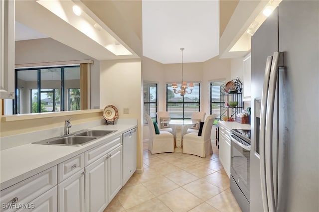 24979 Paradise Rd, Bonita Springs, FL 34135 - kitchen with refrigerator with ice dispenser, a sink, stainless steel electric stove, dishwasher, and light tile patterned flooring