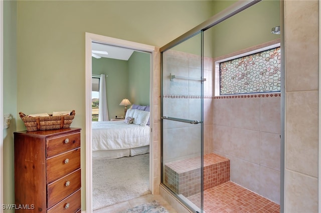 24979 Paradise Rd, Bonita Springs, FL 34135 - bathroom featuring a stall shower, ensuite bath, and tile patterned flooring