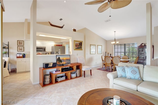 24979 Paradise Rd, Bonita Springs, FL 34135 - living room featuring vaulted ceiling, light tile patterned floors, ceiling fan, a chandelier, and baseboards