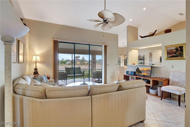 24979 Paradise Rd, Bonita Springs, FL 34135 - living room with a ceiling fan, lofted ceiling, and light tile patterned floors