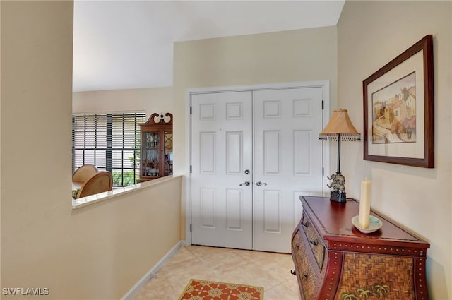 24979 Paradise Rd, Bonita Springs, FL 34135 - tiled foyer entrance with baseboards