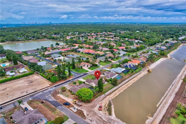 24979 Paradise Rd, Bonita Springs, FL 34135 - aerial overview of property's location featuring a nearby body of water and nearby suburban area