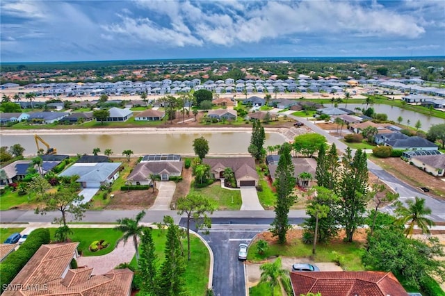 24979 Paradise Rd, Bonita Springs, FL 34135 - aerial perspective of suburban area featuring a nearby body of water