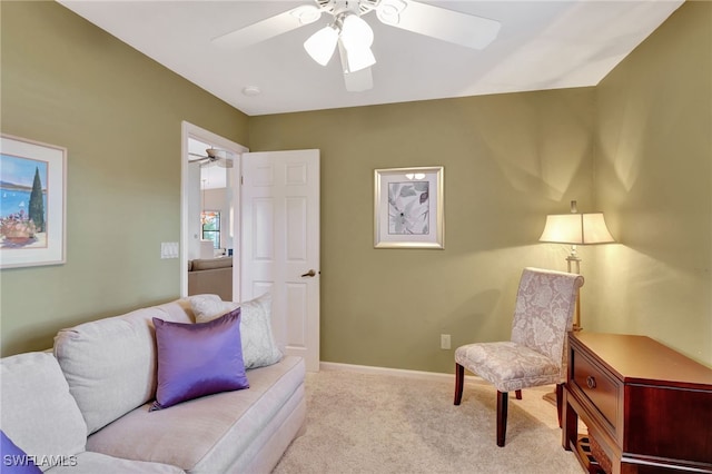 24979 Paradise Rd, Bonita Springs, FL 34135 - living area with a ceiling fan, carpet, and baseboards