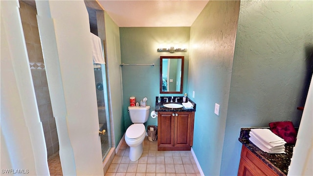 8161 Moyer Ln, Bokeelia, FL 33922 - bathroom featuring tile patterned floors, a stall shower, toilet, and vanity