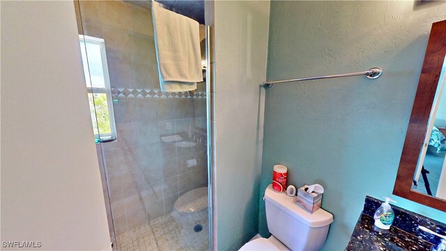 8161 Moyer Ln, Bokeelia, FL 33922 - bathroom featuring toilet and a shower stall