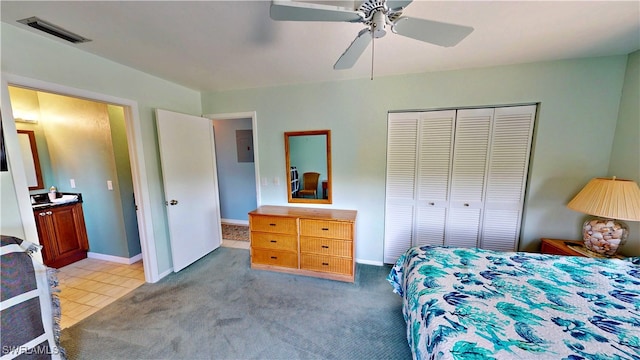 8161 Moyer Ln, Bokeelia, FL 33922 - bedroom with a closet, electric panel, ceiling fan, and baseboards