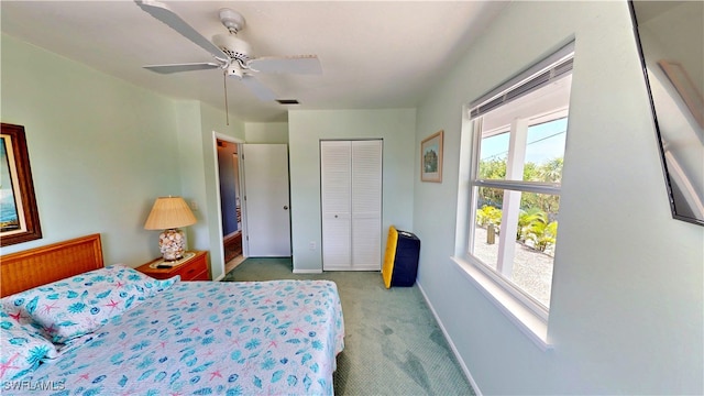 8161 Moyer Ln, Bokeelia, FL 33922 - carpeted bedroom featuring baseboards, a closet, and ceiling fan