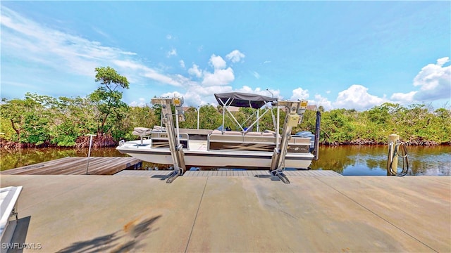 8161 Moyer Ln, Bokeelia, FL 33922 - dock featuring a water view and boat lift