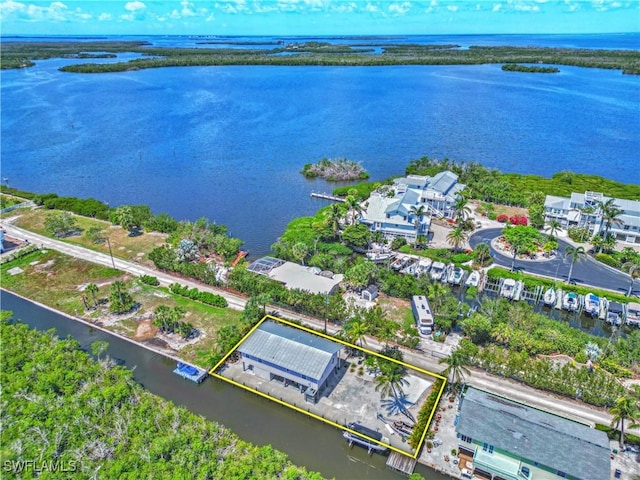 8161 Moyer Ln, Bokeelia, FL 33922 - aerial view of property and surrounding area with a nearby body of water and property parcel outlined